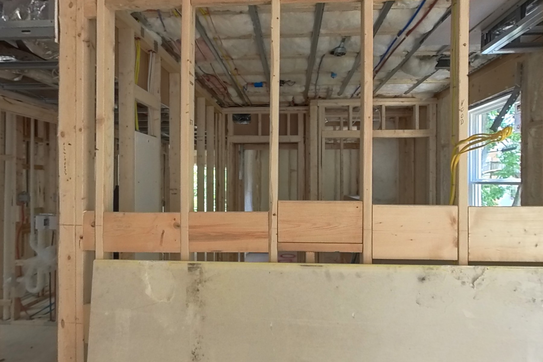 Unit framing and MEP rough-in advancing.
